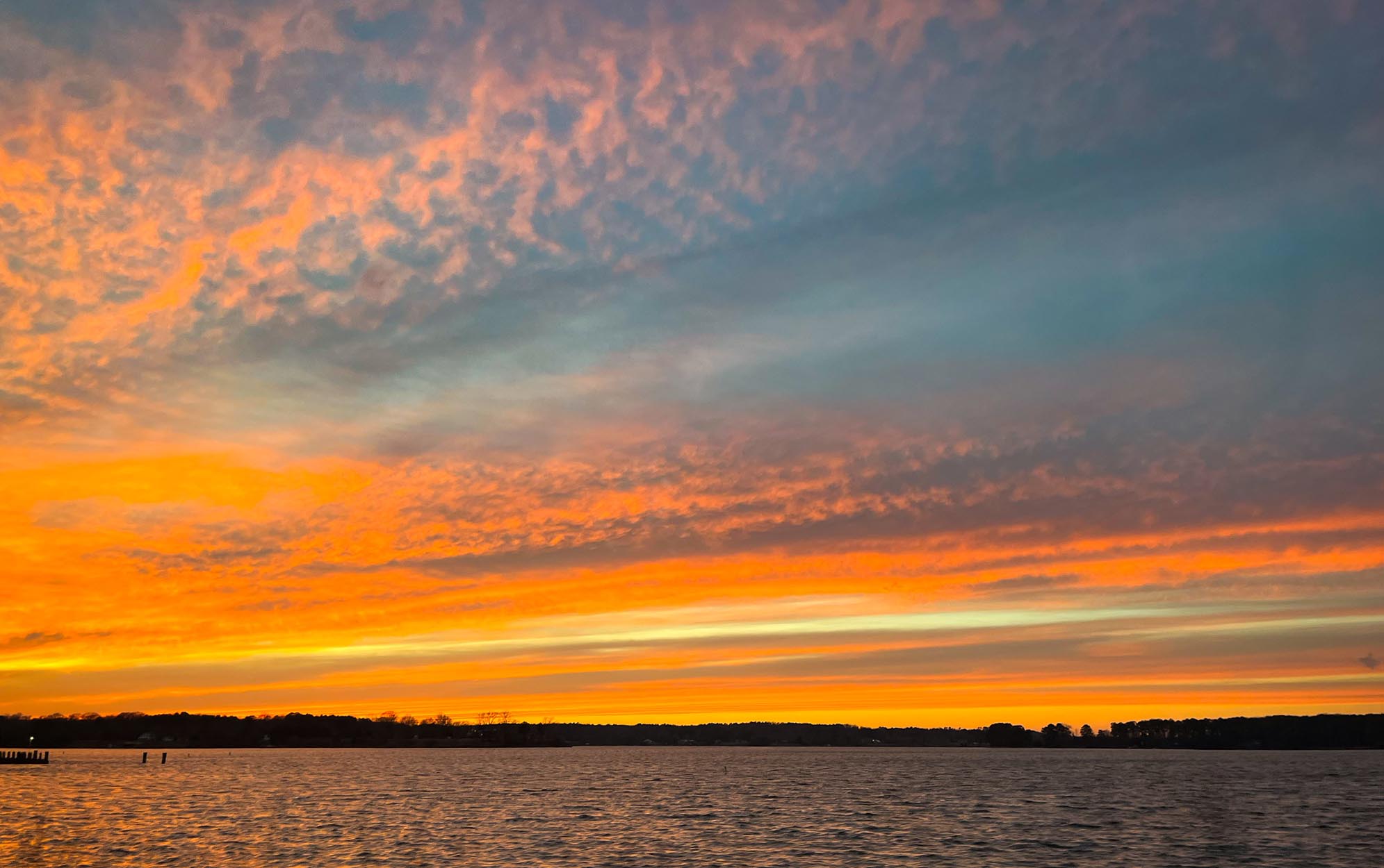 A beautiful orange and blue sunset over the St. Mary’s River 