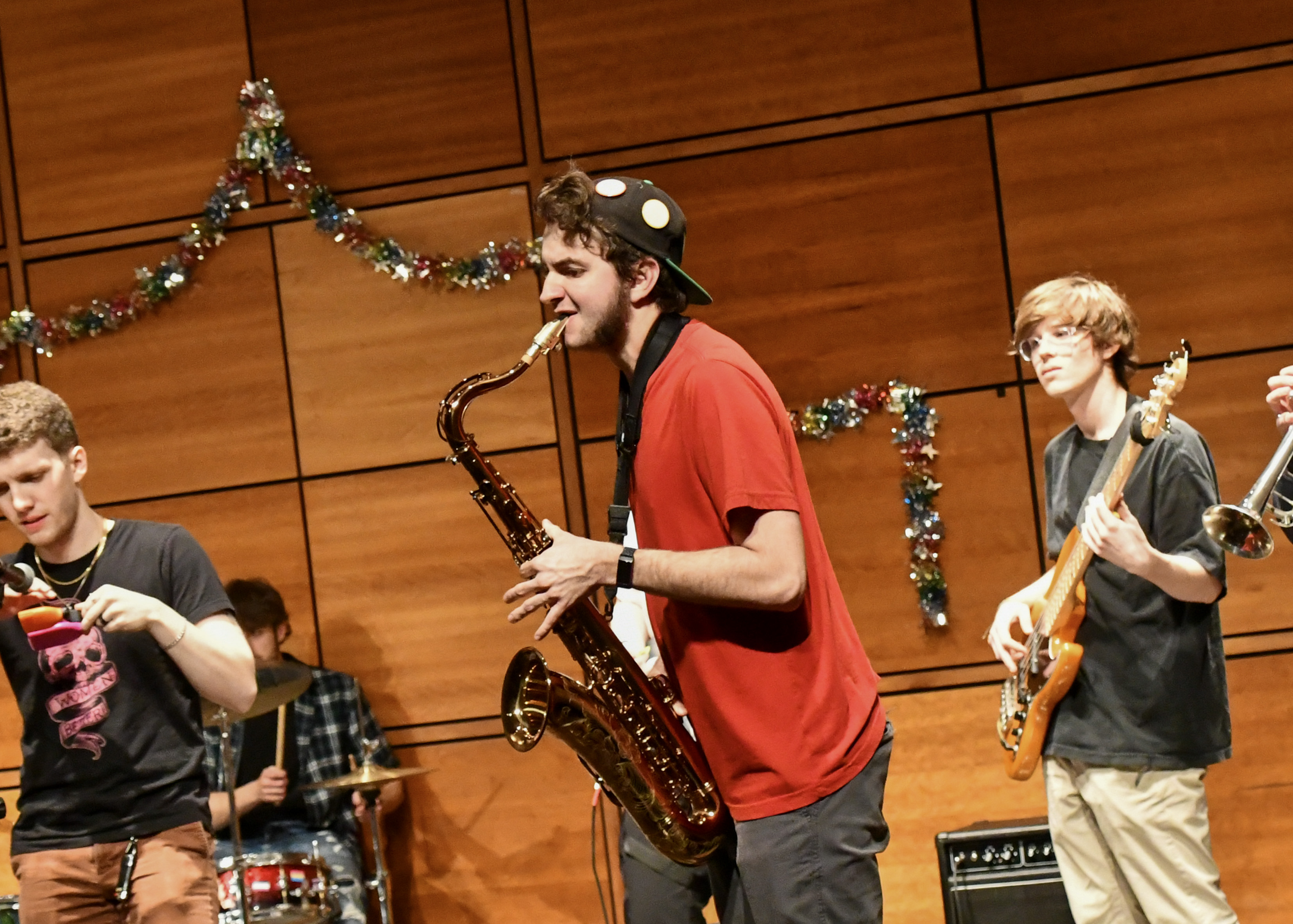 A member of SMCM Music Club plays saxophone during Spring showcase 