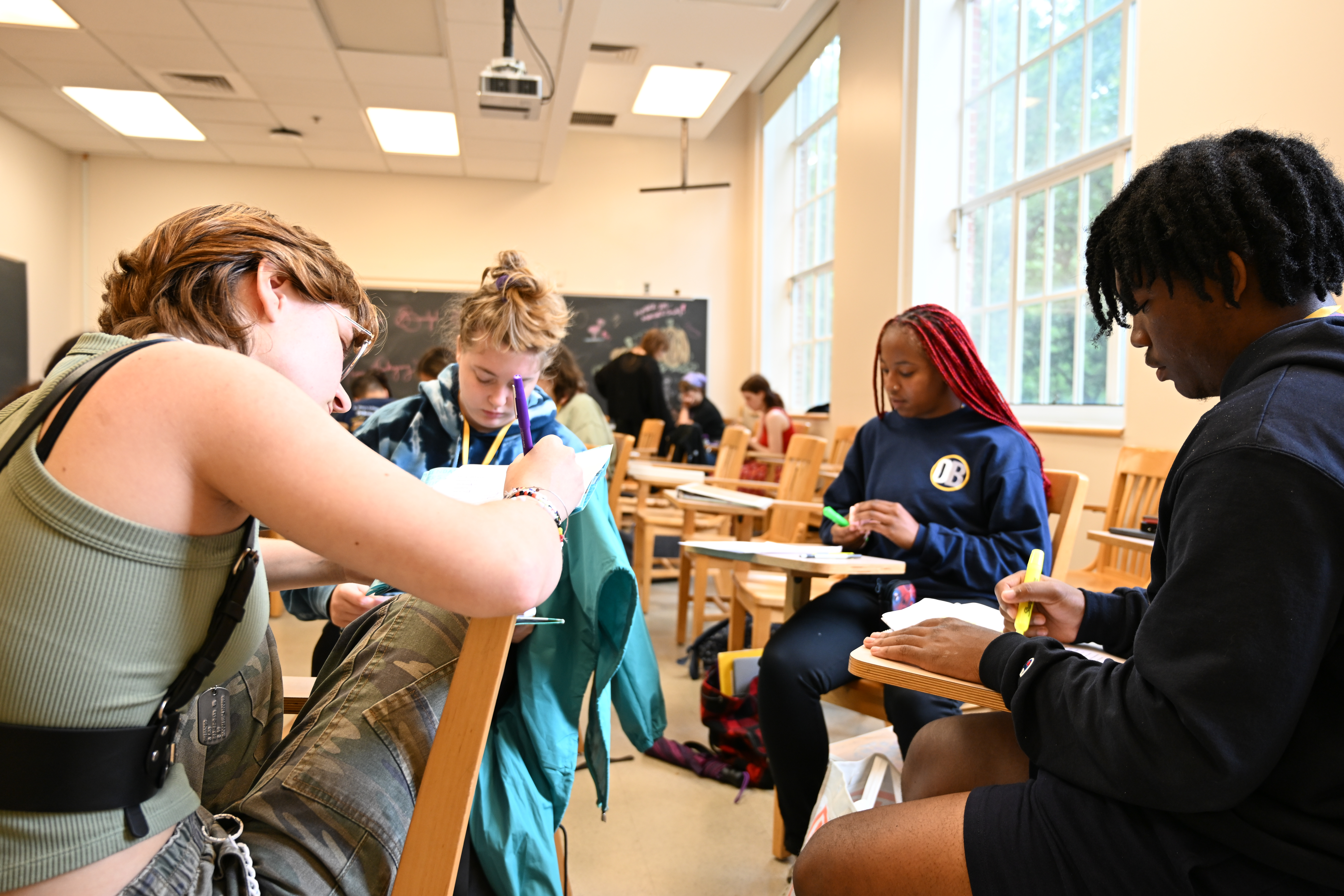 students working in a classroom 