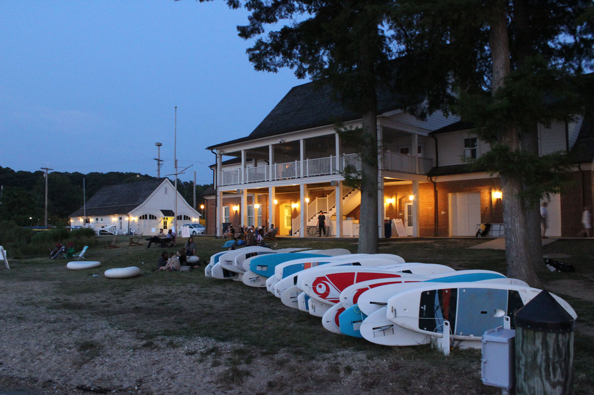 River Center at night with paddleboards