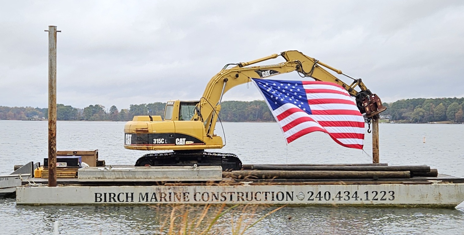 American flag flying off a barge