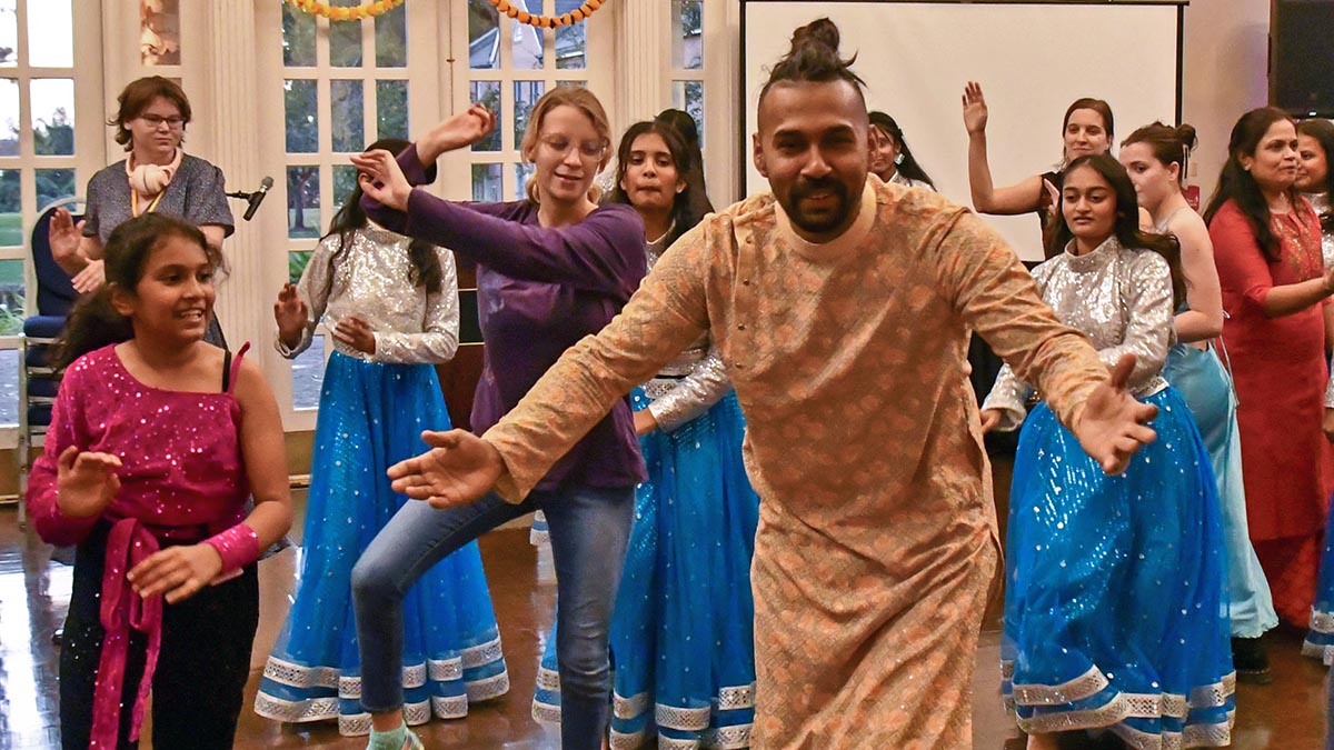 Group dancing in colorful costumes