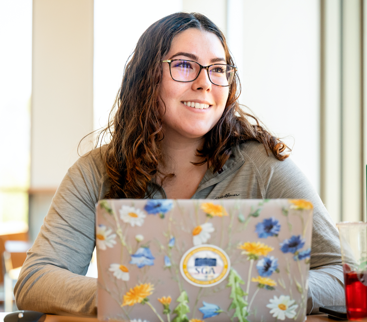 SMCM student working at her laptop