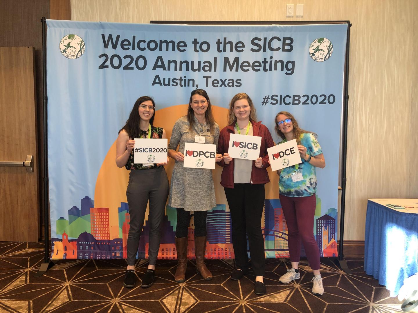 Malisch, center, stands with students Ivy Antunes, Ava Chrisler and Melanie Kimball 