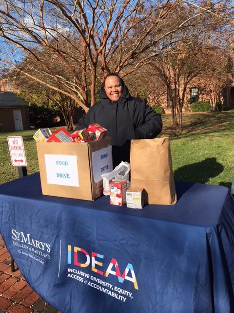 An SMCM staff member collects food donations