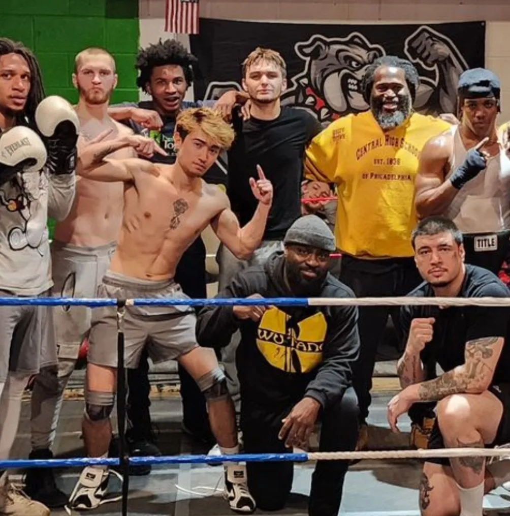 SMCM Boxing Club posing in boxing ring