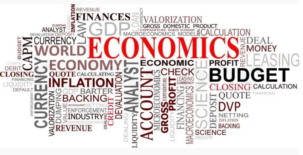 A word cloud featuring terms related to economics, with prominent words like "ECONOMICS," "BUDGET," "INFLATION," "ACCOUNT," and "CURRENCY" in various sizes and orientations, emphasizing related concepts and themes.