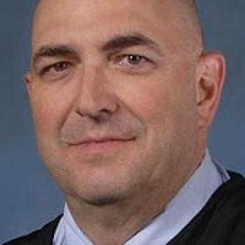 Honorable Daniel A. Friedman pictured