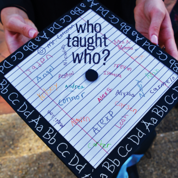 graduation cap pictured with Who Taught Who? written across it