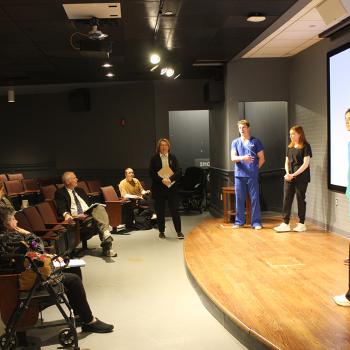 Osborne with River Center Urgent Clinic team and judges