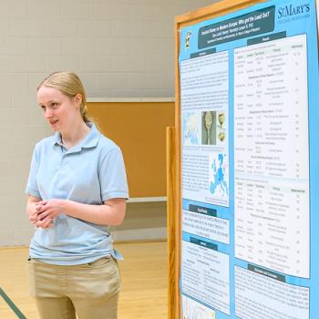 student presenting research