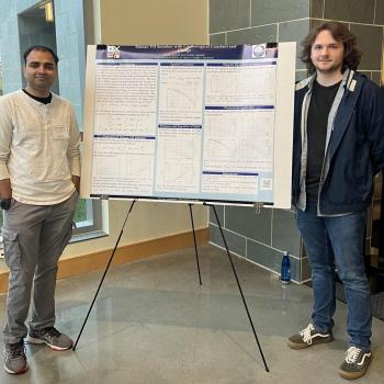 James Ripple (right) and Anish Agashe (left) at the APS-MAS 2023 meeting.