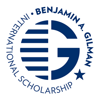 Logo of the Benjamin A. Gilman International Scholarship, featuring a stylized "G" with horizontal stripes and a star, surrounded by the program name in blue text.