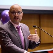 Rafael addressing a gathering of LGBTQ+ students, faculty and staff in 2023. 