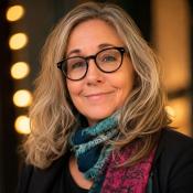 Femail with glasses and scarf