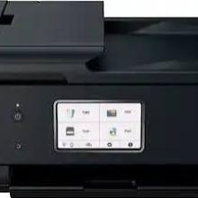 A black Canon all-in-one printer with a touchscreen display and paper tray, shown from the front.