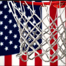 a basketball hoop pictured in front of an American flag