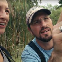 St. Mary's College of Maryland Professor Barry Muchnick and student in the field observing pond water