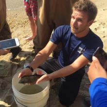 Isaac Hersh '19 with a summer flounder