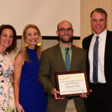 Pictured with (l-r) Cape school board President Alison Myers, Assistant Superintendent Jenny Nauman, Clarke and Cape Superintendent Bob Fulton, from Cape Gazette Newspaper.