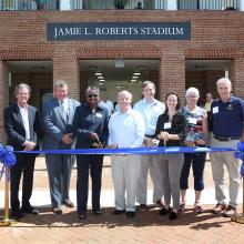 (L-R) St. Mary’s College Board of Trustees Chair Arthur “Lex” Birney, Maryland State Senator Jack Bailey, St. Mary’s College President Tuajuanda C. Jordan; Jamie L. Roberts father Bob, brother Will, sister Julia, mother Eveline; and St. Mary’s College Director of Athletics & Recreation Scott Devine.