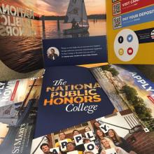 postcards and folder pictured