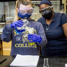 faculty member and student in a lab pictured