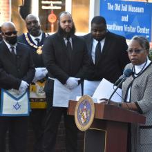President Tuajuanda Jordan delivers keynote address outside of the Leonardtown Jail museum 
