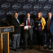 From left, Mark J. Potter: President and CEO of the Maryland Science Center – Dr. Troy Townsend, Outstanding Young Scientist – Mollie Mulherin Thompson: Vice Chair of the Maryland Science Center’s Science and Education Advisory Council