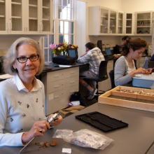 Professor Julia King working with students in her lab 