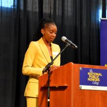 AD Crystal Gibson pictured on stage during the 2021 Athletic Hall of Fame ceremony 