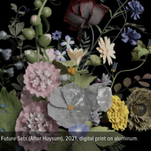 fake flowers against a black background.