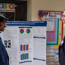 Student presenter with judge