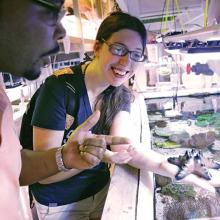 Professor and student using aquatic lab