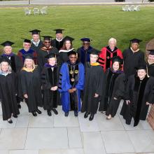 SMCM President Tuajuanda  Jordan (center, blue regalia) with members of the SMCM Board of Trustees, May 2023