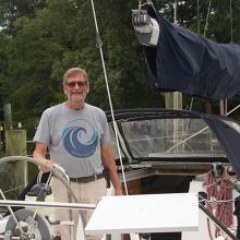 Captain Rick Loheed aboard Poor Richard