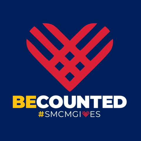 A red heart-shaped graphic above the words “BE COUNTED” and hashtag “#SMCMGIVES” on a dark blue background.