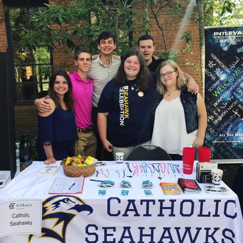 Aidan McNary-Hickey with other Catholic Seahawks