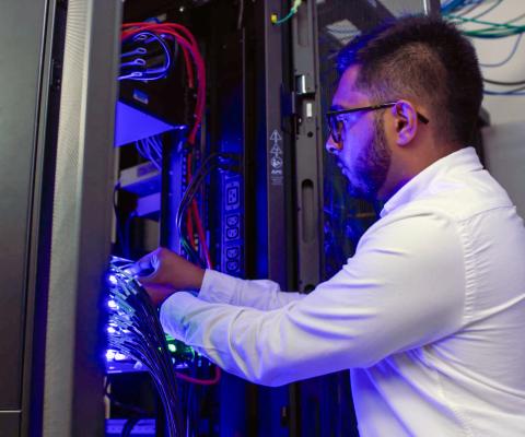 Shameer Rao '24 working in server rack