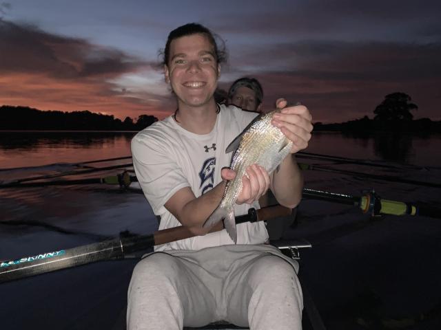 A fish jumped into a rowing boat during practice