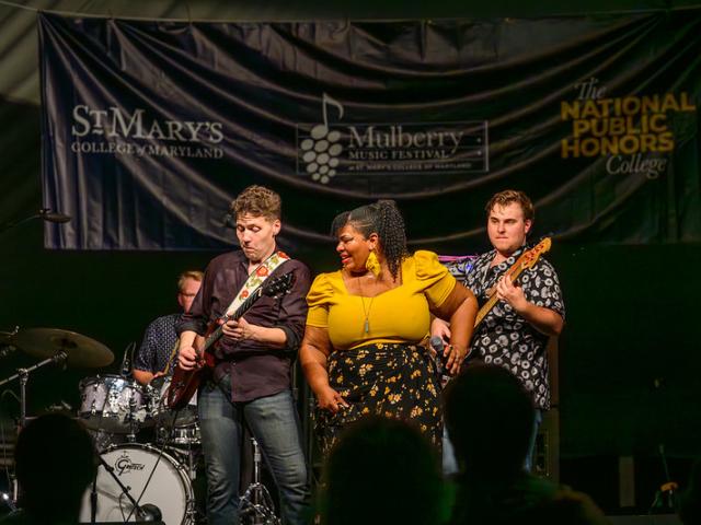 Band members on stage