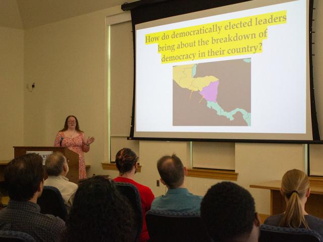 Student giving presentation to audience