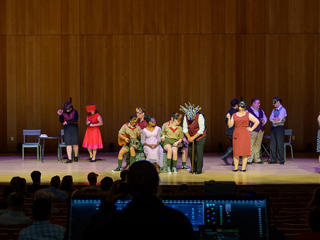 Costumed characters on stage