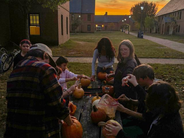 Students Carve Pumpkins with the Veggie Co-op and Sustainability Club at Sunset on LiveWell Day