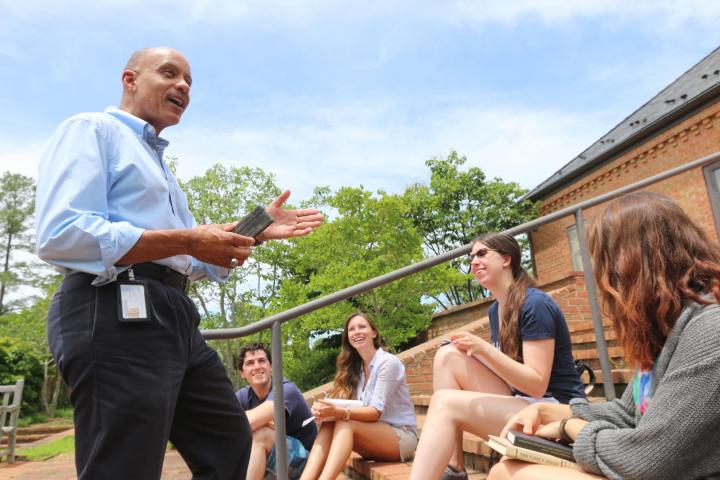 Faculty member with students pictured