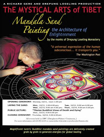 Tibetan monk carefully laying colored sand onto the sand mandala.