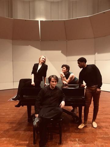 Michael Casey, Rachael Meador, Derrick Miller, Jeanette Warren around piano in Montgomery Hall 25