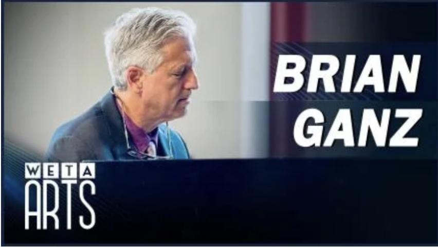 Older man with gray hair focused, wearing a jacket, against a blurred background. The text reads "Brian Ganz" and "WETA Arts" on the image.