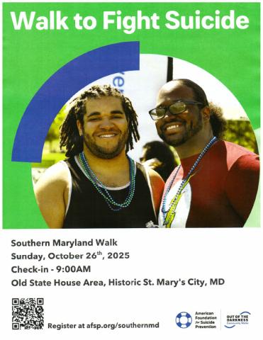 Two smiling men stand side by side outdoors at a Walk to Fight Suicide event; event details and logos are displayed below.