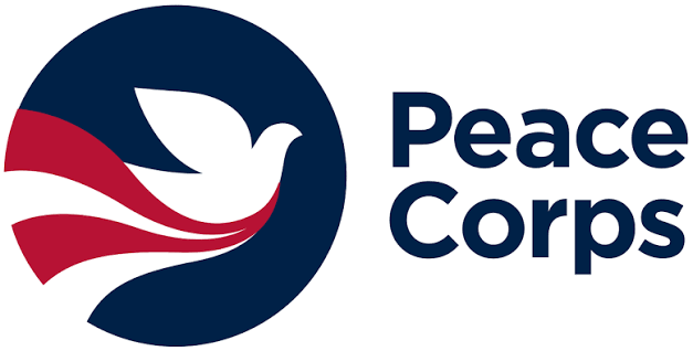 Peace Corps logo with a white dove and red stripes in a dark blue circle, next to the words “Peace Corps” in bold blue letters.